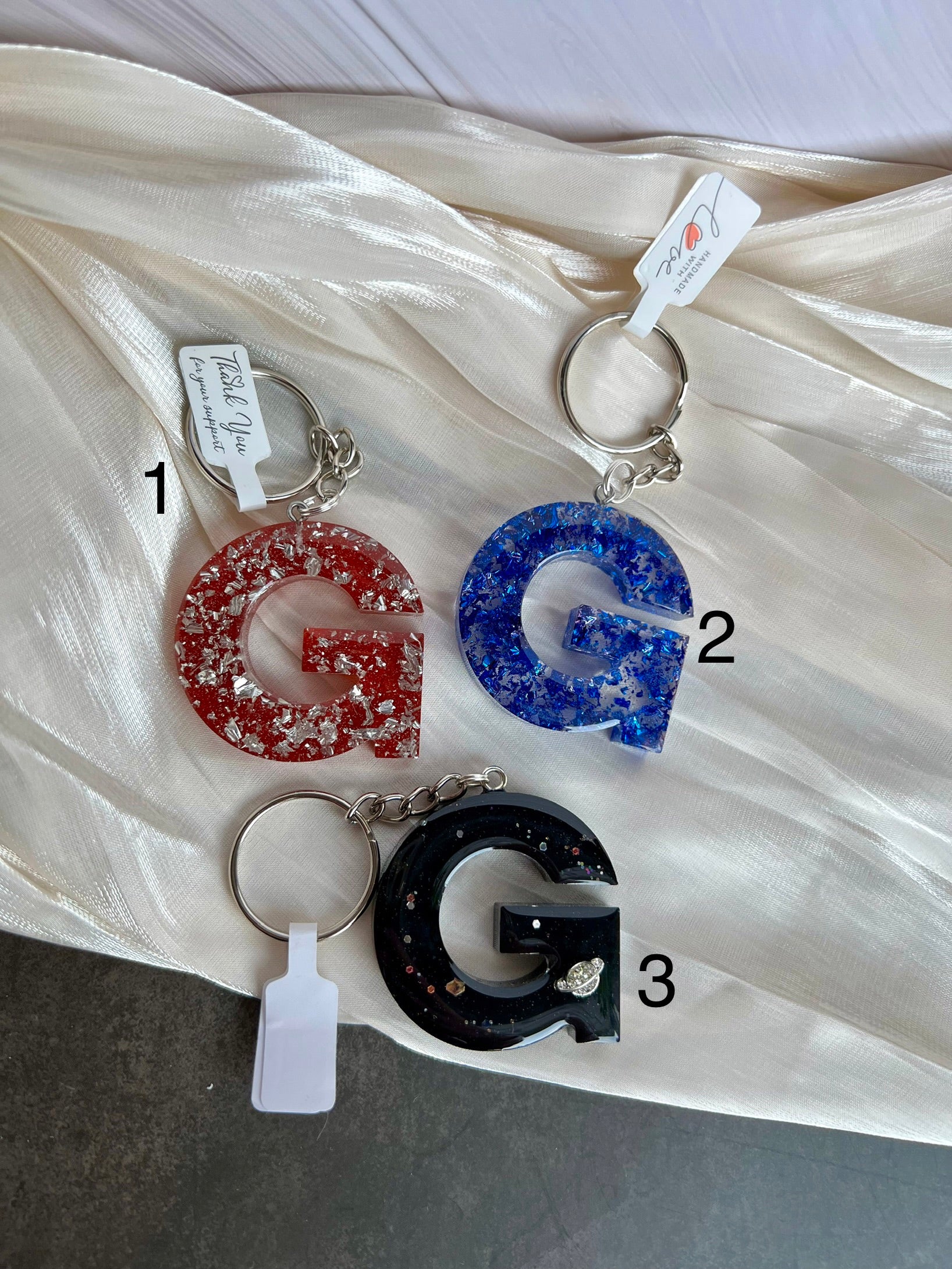 Schlüsselanhänger Buchstabe Silber